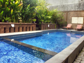Гостиница Waringin Homestay  Kuta